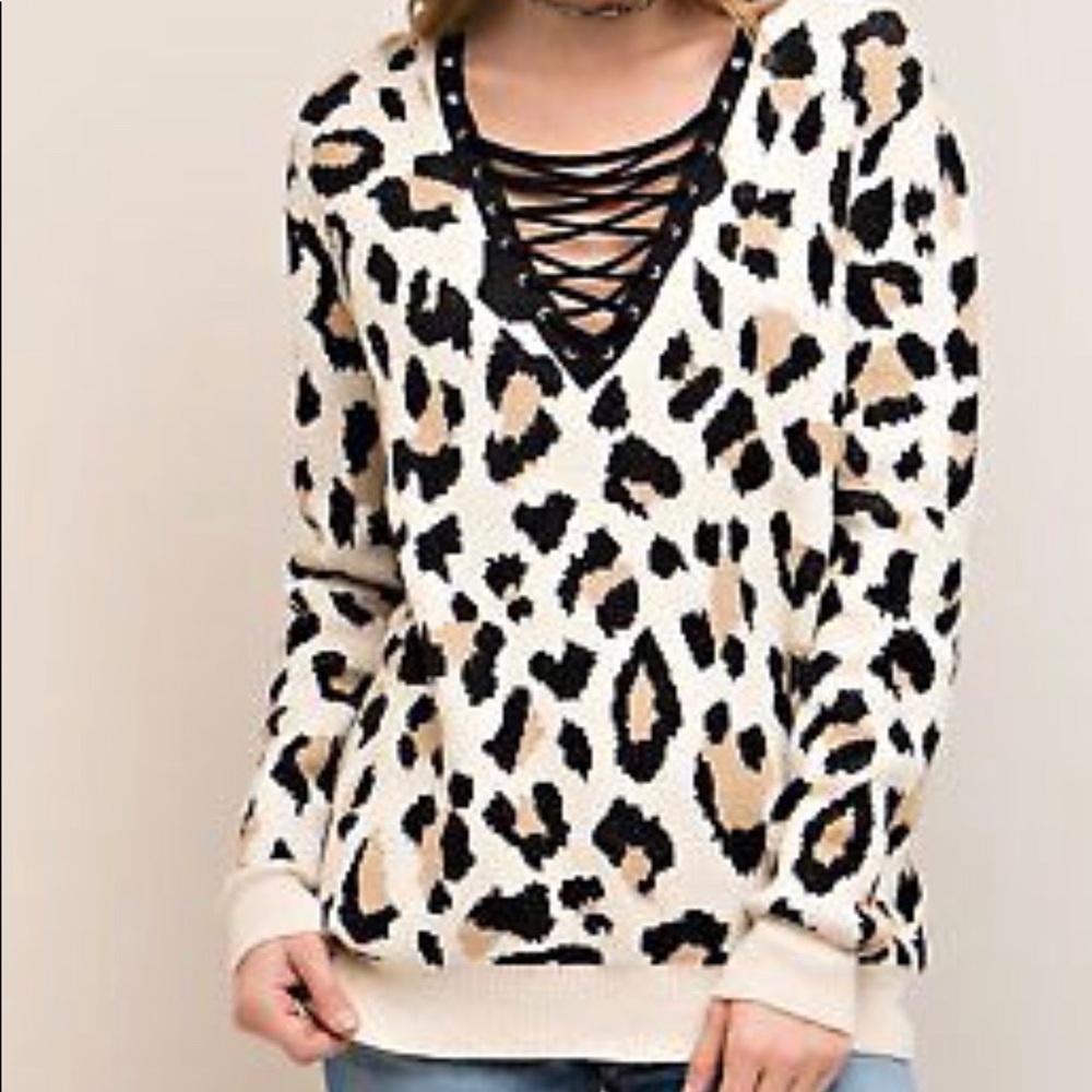 Magnolia Boutique Leopard Lace Up Sweater